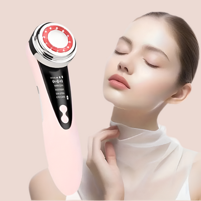 Masajeador facial con frío y calor antiarrugas rosa