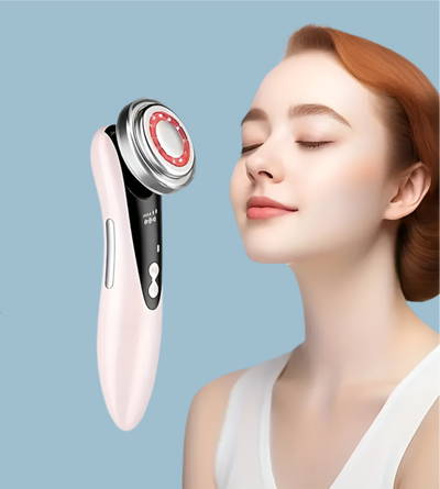 Masajeador facial con frío y calor antiarrugas rosa